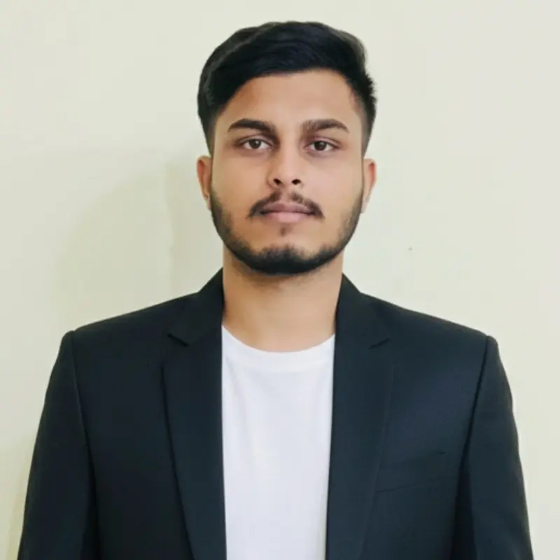 Professional headshot of a man in a suit